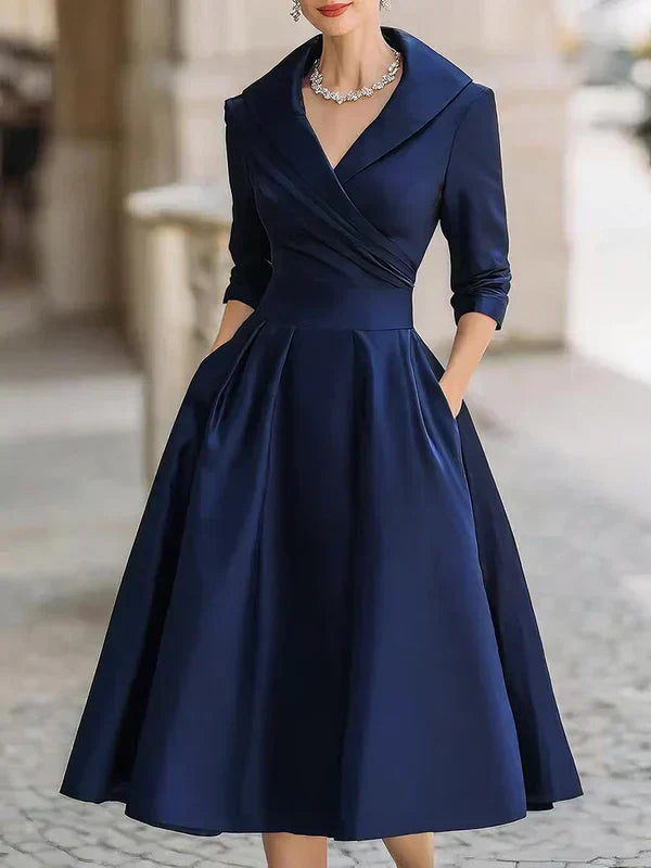Lenka – Elegantní Midi Šaty s Praktickými Kapsami